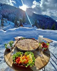 Traditional Kosovar dishes served on a table